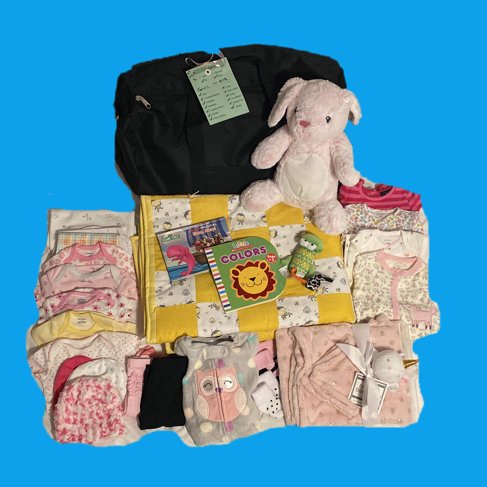 <b><h5>Blue Bag Program supplies blue bags<br> for the children containing basic necessities.</b></h5>